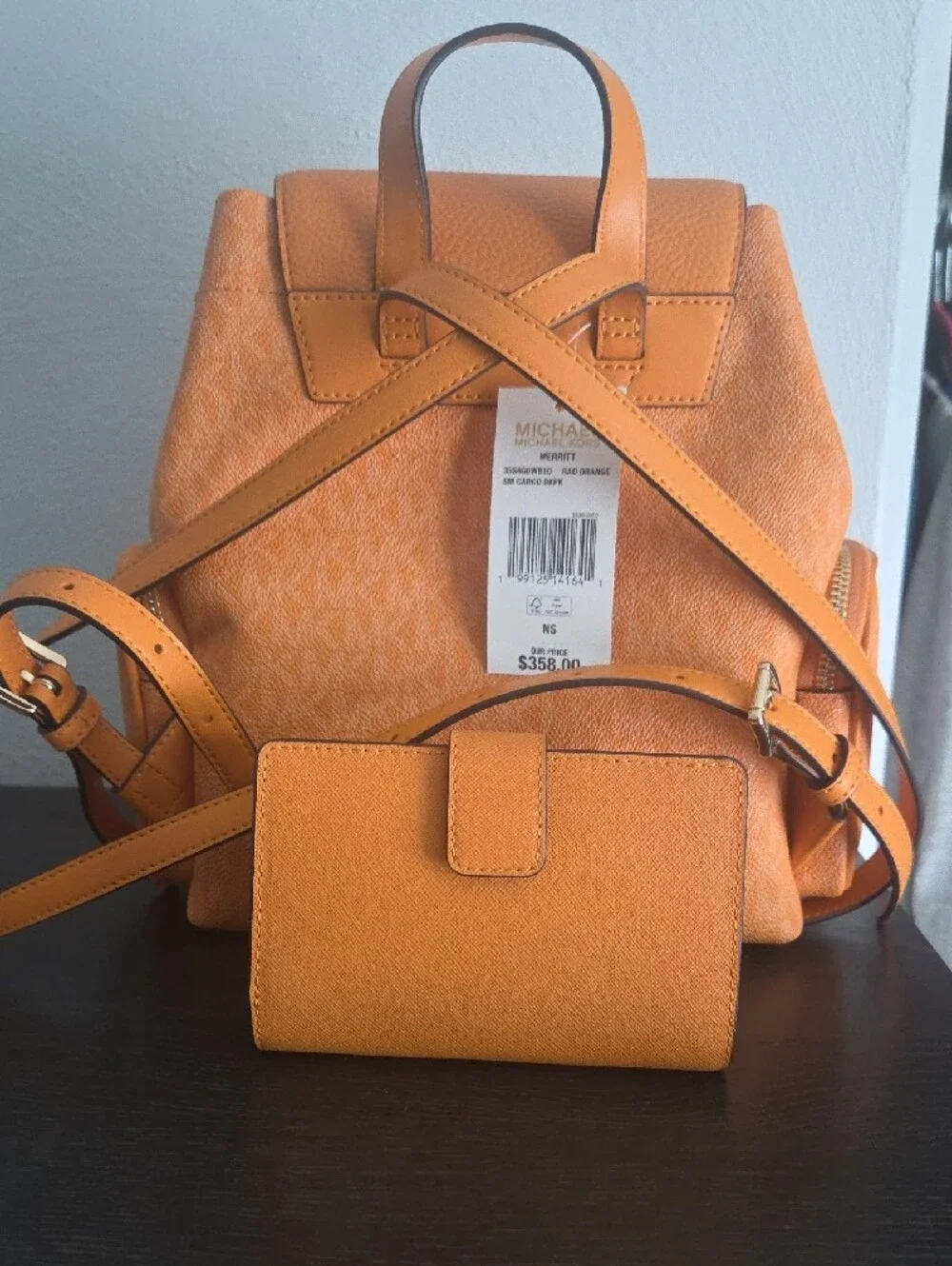 Michael Kors Orange Textured Backpack with Matching Wallet